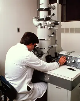 Labs: Man Operating a Scanning Electron Microscope