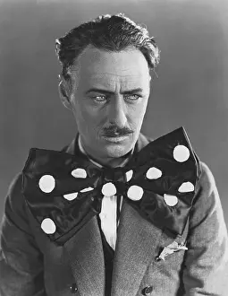 Distrustful: Man in oversized bow tie
