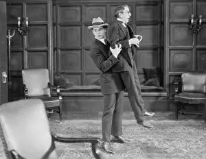 Dread: Man picking up frightened man
