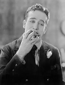 Daydreams: Man with a piece of cake in his mouth