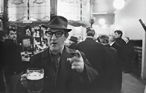 Pint: Man with pint, pointing at camera, Birch Villa pub