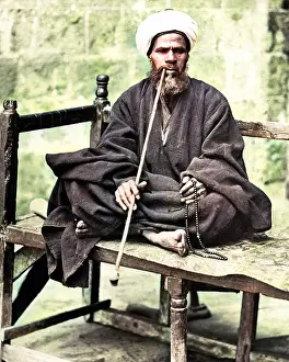 Beads: Man with pipe and beads, Egypt