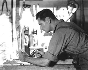 Planing: Man Planing Wood