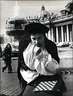Carlangelo: Man playing chess without the pieces, Italy