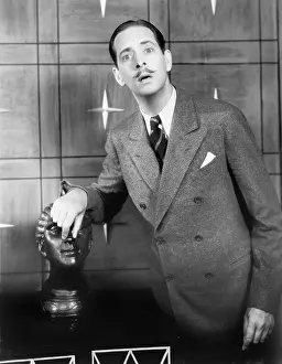 Mustaches: Man playing and doing silly things with a bust