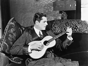 Guitars: Man playing guitar
