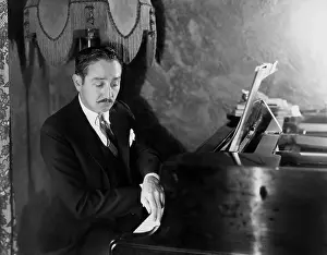 Mustaches: Man playing piano