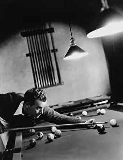 Diversion: Man playing pool