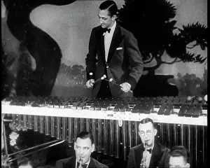 Xylophone: Man Playing the Xylophone Above a Jazz Band