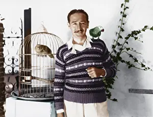 Mustaches: Man posing with pet birds