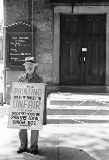 Picketing: Man - protest - sign - picketing