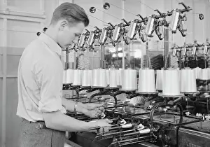 Reel: Man quilling rayon at the William Skinner
