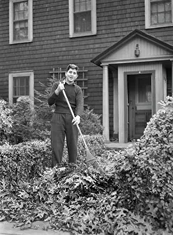 Raking: Man - raking - leaves - autumn