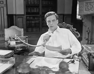 Drafting: Man reading into Dictaphone