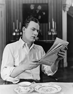 Informative: Man reading the newspaper