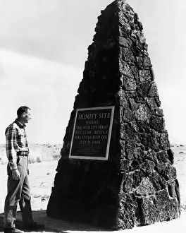 Socorro: A man reading the plaque on a monument at ?