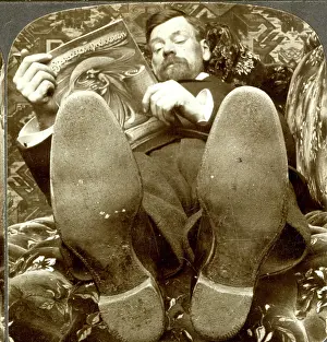 Stereo: Man reading Stereoscopic Photograph magazine