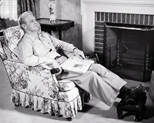 Chintz: Man Resting Thinking Sitting in Chintz Covered
