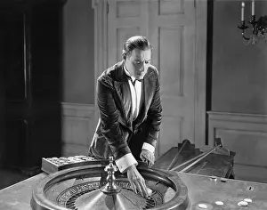 Gamblers: Man with roulette table