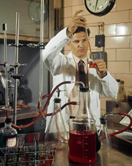 Beakers: Man Scientist Chemist Biologist Technician Siphoning