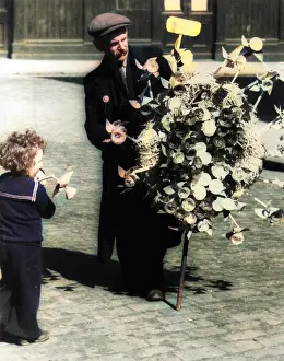 Windmills: Man selling toy windmills