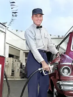 Laboring: Man Service Station Attendant Wearing Cap and