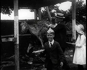 British Pathé Ltd: Man Serving Slices Of Ox From A Whole Roasted