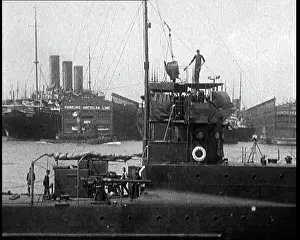 Signalling: A Man On Top of a Ship Signalling Using Semaphore Flags