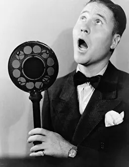 Mouths: Man singing with radio microphone