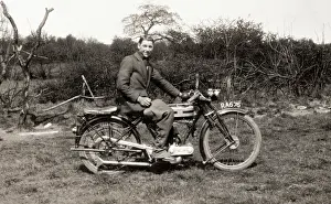 500cc: Man sitting on his 1925 Triumph 500 motorcycle