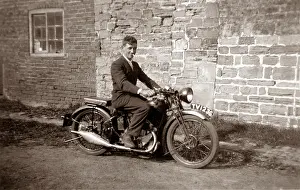 350cc: Man sitting on 1929/30 BSA motorcycle