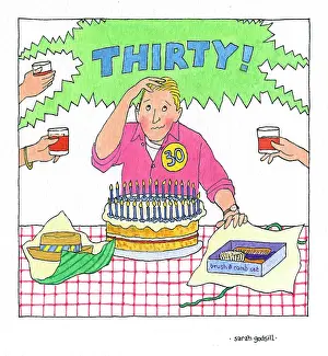 Godsill: Man sitting in front of 30th birthday cake