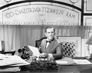 Diversion: Man sitting at his desk in the office