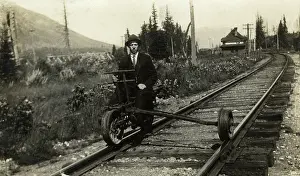 Fernie: A man sitting on part of a modified railway suspension