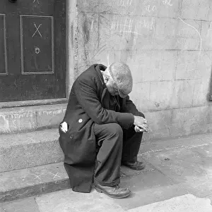 Tiredness: Man Sitting On Steps