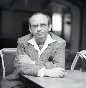 Balding: Man sitting at a table