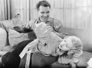 Ache: Man spanking a woman