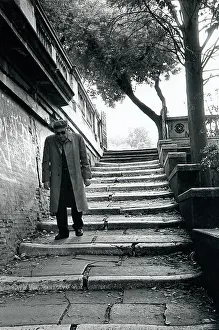 Grafitti: Man on steps in Rome, Italy
