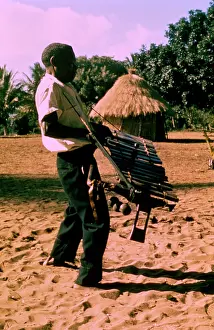 Soloists: Man taking a solo during timbila orchestra performance