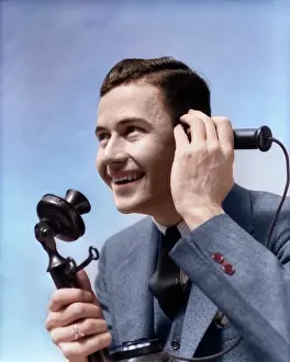 Businesspeople: Man Talking on Candlestick