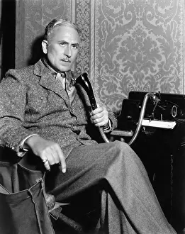 Elders: Man talking on an old fashioned telephone