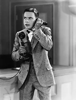 Stress: Man talking on the telephone looking stressed