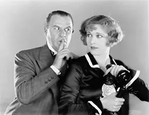 Romances: Man telling a woman to be discrete when she is on