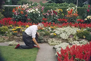 Crouches: MAN TENDING GARDEN