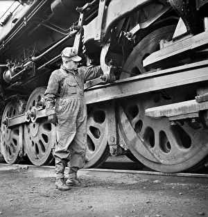 Oiling: man - train engineer - occupations - railroad