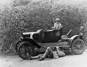 Jmlook: Man trying to fix a broken down car