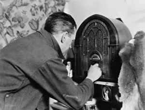 Tuning: Man tuning the radio