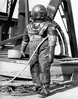 Galoshes: Man in underwater diving suit