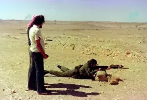 The British Caribbean History Collection: Man in uniform shooting in Oman