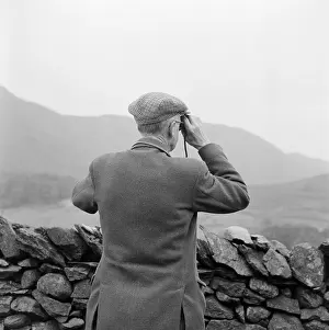 Fells: Man Using Binoculars